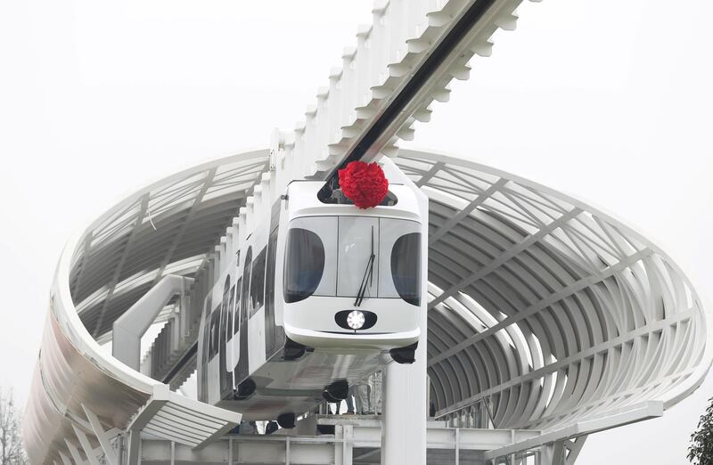 Mandatory Credit: Photo by Xinhua/Shutterstock (7450143c)
A train suspended from a railway line runs in Chengdu, capital of southwest China's Sichuan Province
Suspension railway line, Chengdu, Sichuan Province, China - 21 Nov 2016
After two months of tests, China's first suspension railway line met all designed requirements and it is ready for more systematic operations.