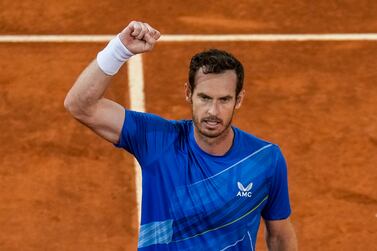 Andy Murray, of Britain, celebrates his victory over Dominic Thiem of Austria during their match at the Mutua Madrid Open tennis tournament in Madrid, Spain, Monday, May 2, 2022.  (AP Photo / Manu Fernandez)