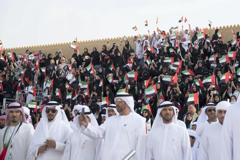 AL WATHBA, ABU DHABI, UNITED ARAB EMIRATES - December 03, 2017: Audience members watch the Union March during the Sheikh Zayed Heritage Festival. 

( Mohamed Al Suwaidi for the Crown Prince Court - Abu Dhabi )
---