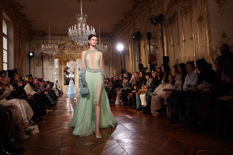 A delicate dress in seafoam green by the Lebanese label. AFP