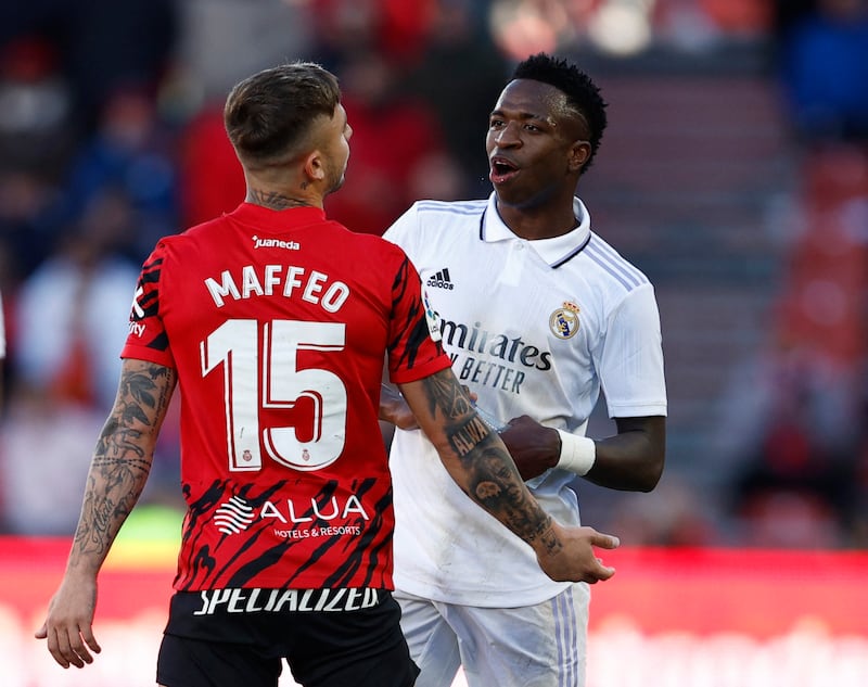 Real attacker Vinicius Junior argues with  Mallorca's Pablo Maffeo. Reuters