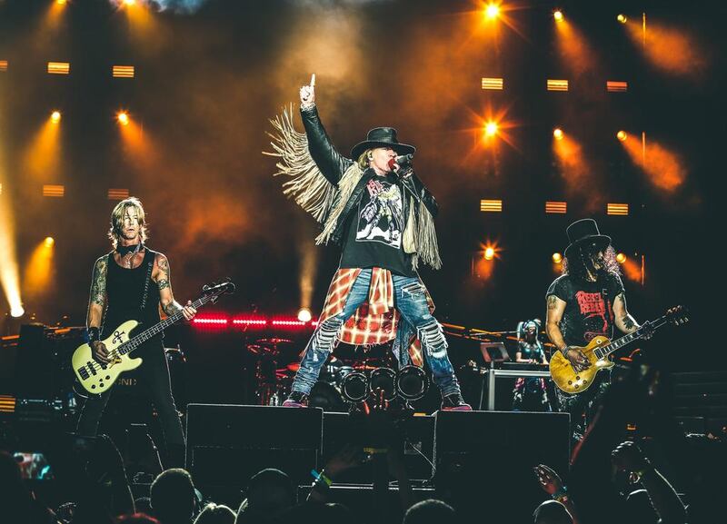 The classic Guns N' Roses line up of frontman Axl Rose, guitarist Slash and bassist Duff McKagan. Photo: 117Live