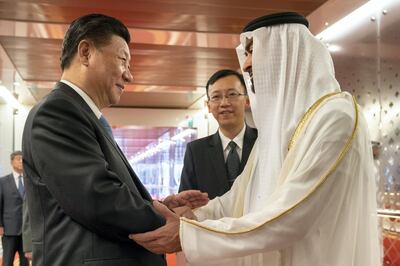 ABU DHABI, UNITED ARAB EMIRATES - July 21, 2018: HH Sheikh Mohamed bin Zayed Al Nahyan, Crown Prince of Abu Dhabi and Deputy Supreme Commander of the UAE Armed Forces (R) bids farewell to HE Xi Jinping, President of China (L), at the Presidential Airport. 

( Mohamed Al Hammadi / Crown Prince Court - Abu Dhabi )
---