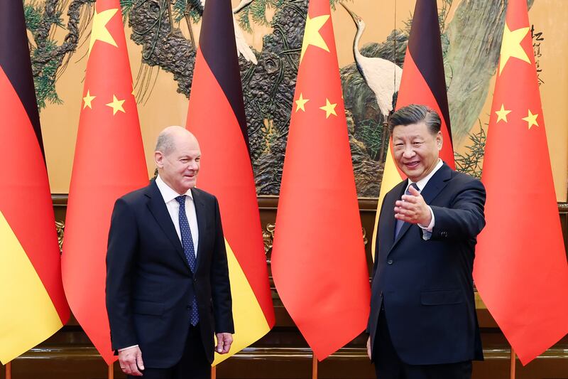 German Chancellor Olaf Scholz and Chinese President Xi Jinping, in Beijing, on November 4. AP