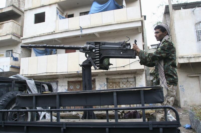 A resistance fighter mans a machine gun on the back of a patrol truck in the south-western city of Taiz on November 12, 2015. Resistance forces, backed by the Arab coalition, are battling Houthi rebels for control of the city. Anees Mahyoub/Reuters 