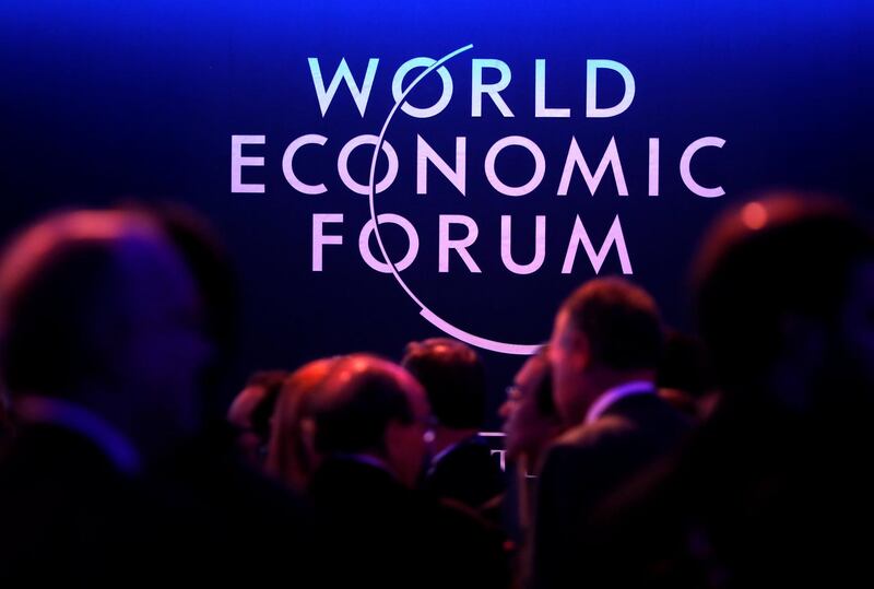 A logo of the World Economic Forum (WEF) is seen as people attend the WEF annual meeting in Davos. Denis Balibouse / Reuters