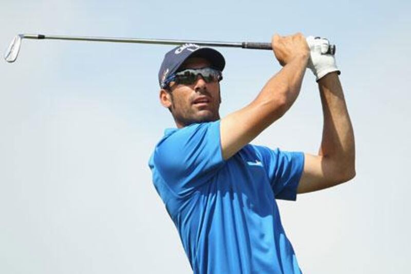 Alvaro Quiros had a hole-in-one, chipped in for an eagle and also lost a ball up a palm tree in a final-round 68 to win by a stroke at 11-under par.