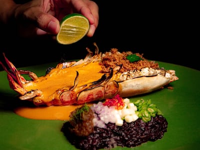 The khao kluk kapi, or river prawn, with black rice, is a year-round dish on the Le Du menu. Photo: Le Du