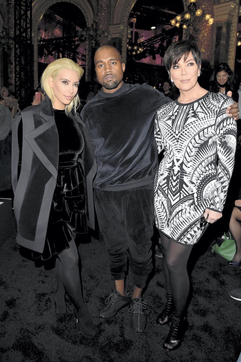 PARIS, FRANCE - MARCH 05:  Kim Kardashian, Kanye West and Kris Jenner attend the Balmain show as part of the Paris Fashion Week Womenswear Fall/Winter 2015/2016 on March 5, 2015 in Paris, France.  (Photo by Pascal Le Segretain/Getty Images)
