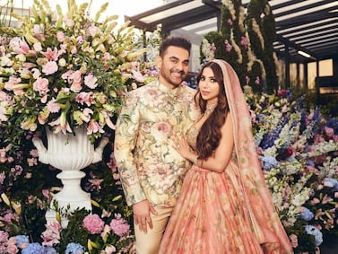 The newlyweds were dressed in peach-hued floral attires. Photo: @arbaazkhanofficial / Instagram