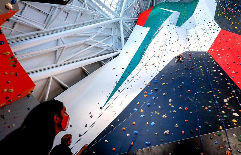 Abu Dhabi, United Arab Emirates, August 20, 2020.   Jason Von Berg of The National scales the walls of Cymb Abu Dhabi which  has just been recognised with two Guinness World Records for the largest indoor skydiving wind tunnel and the world’s tallest indoor climbing wall.
Victor Besa /The National
Section:  NA
Reporter:  Jason Von Berg