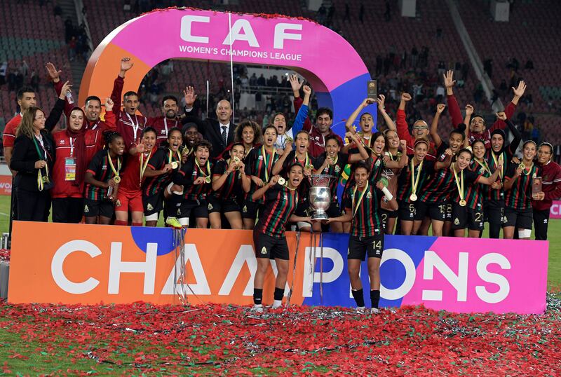 Rabat players celebrate with the trophy after winning the CAF Women's Champions League final between FAR Rabat and Mamelodi Sundowns in Rabat, Morocco, 13 November 2022.   EPA / JALAL MORCHIDI