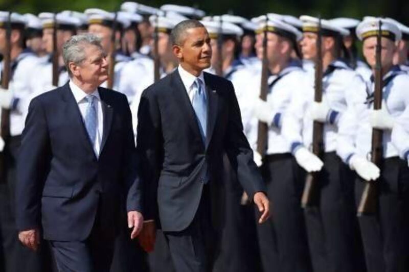 US president Barack Obama and German president Joachim Gauck review a guard of honour during a welcoming ceremony at Schloss Bellevue Presidential Palace in Berlin.