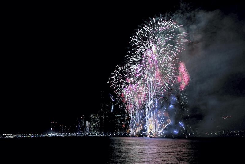 Fireworks at Abu Dhabi Corniche mark the beginning of a New Year. Victor Besa / The National