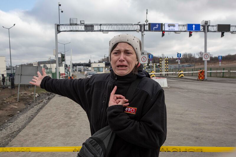 Hanna Pavlovna Lukasz, from Mirhord, Ukraine, said her sons, aged 12 and 8, and her 66-year-old mother had been waiting on the Ukrainian side of the border crossing with Medyka, Poland, for four days. AP