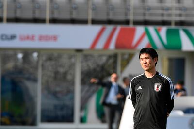 Japan's national football team head coach Hajime Moriyasu attends a training session on the eve of their Group F match in the UAE 2019 Asian Cup against Turkmenistan at the in the Al Nahyan Stadium of Abu Dhabi on January 8, 2019.  / AFP / Khaled DESOUKI
