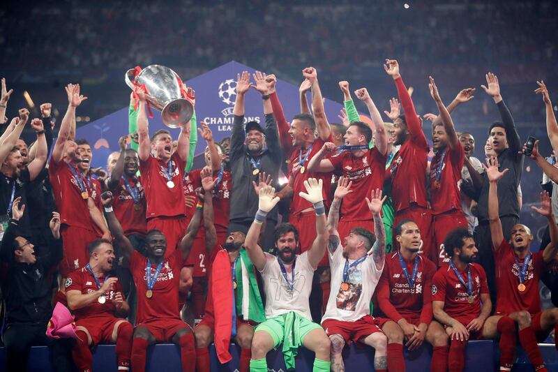 Klopp and his players celebrate their success. Reuters