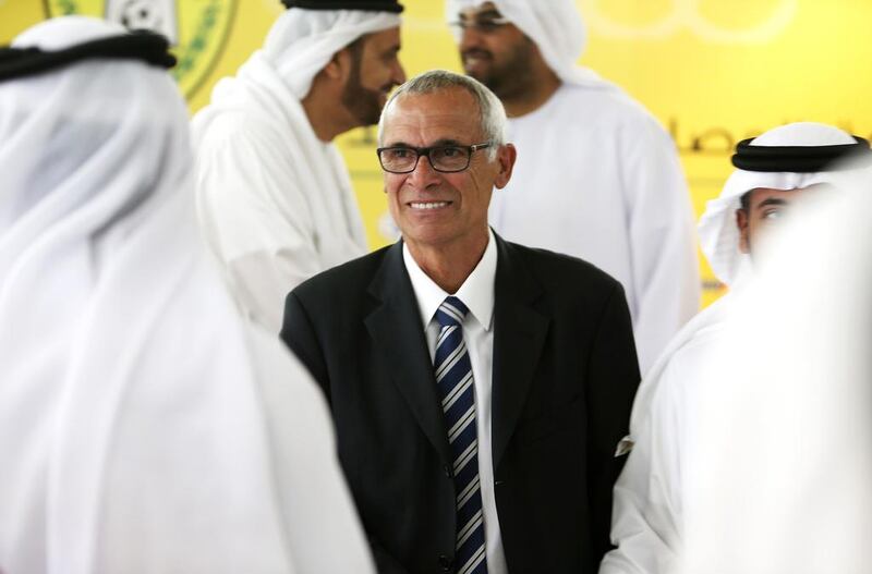 Hector Cuper, centre, the new manager of Al Wasl, says he is not ready to make any predictions on where the club, currently seventh in the Arabian Gulf League, will finish. He also has not had time to reach out to Diego Maradona, but would like to as time permits. Pawan Singh / The National 