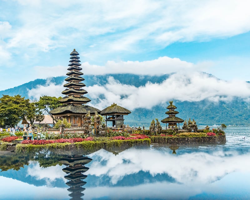 Bali draws travellers in with its beaches, rice fields, flower gardens, temples and secret canyons. Photo: Guillaume Marques / Unsplash