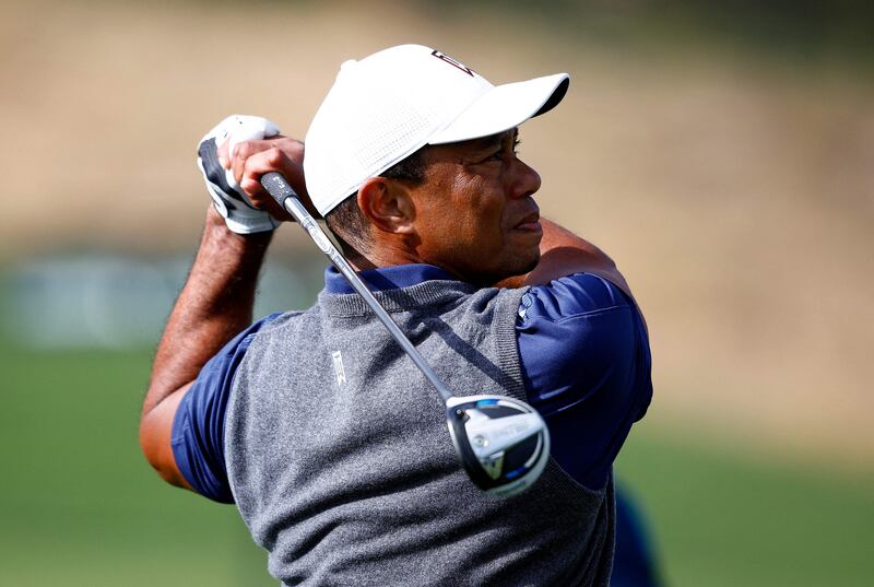 PACIFIC PALISADES, CALIFORNIA - FEBRUARY 14: Tiger Woods of the United States practices on the range prior to The Genesis Invitational at Riviera Country Club on February 14, 2023 in Pacific Palisades, California.    Ronald Martinez / Getty Images / AFP (Photo by RONALD MARTINEZ  /  GETTY IMAGES NORTH AMERICA  /  Getty Images via AFP)