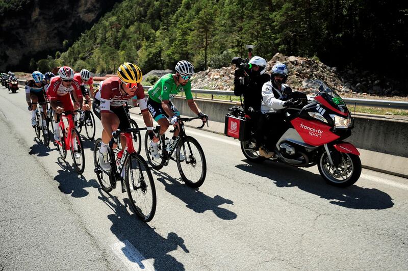 A breakaway group including Cofidis rider Anthony Perez, Toms Skujins of the Trek Segafredo team, and Bora-Hansgrohe's Peter Sagan during Stage 2. EPA