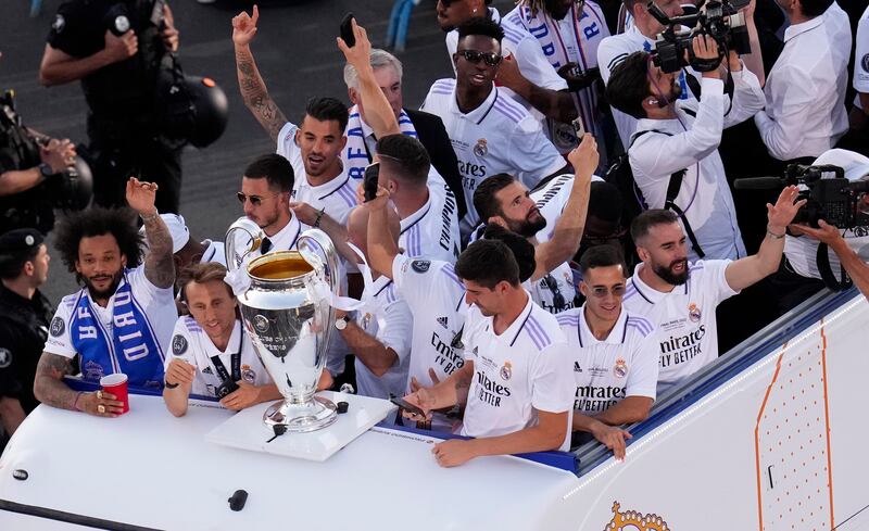 Real Madrid players on an open-top bus during the trophy parade in front of the City Hall in Madrid. AP