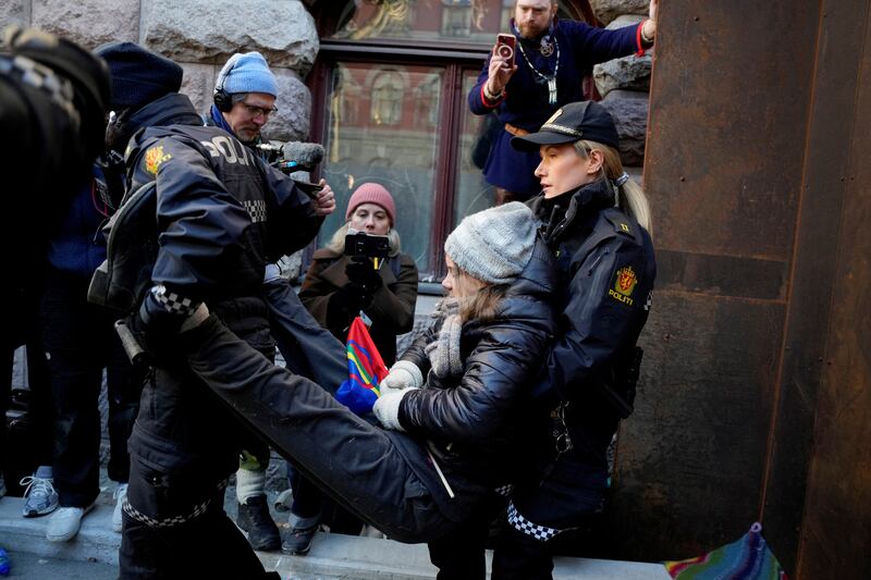 Greta Thunberg is removed by police as activists protest outside the finance ministry in Oslo, Norway. Reuters