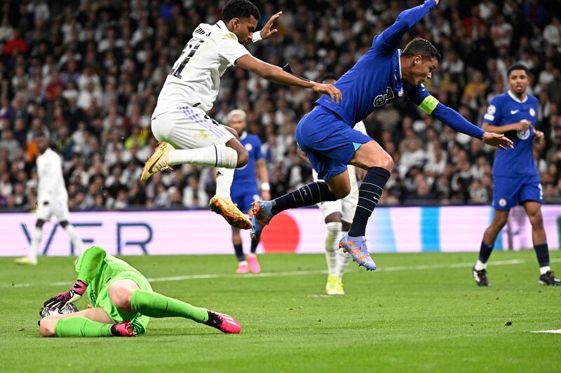 Real Madrid's Rodrygo and Chelsea's Thiago Silva compete. AFP