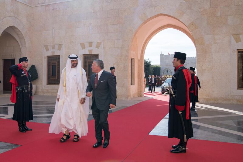 AMMAN, JORDAN - November 20, 2018: HH Sheikh Mohamed bin Zayed Al Nahyan Crown Prince of Abu Dhabi Deputy Supreme Commander of the UAE Armed Forces (2nd L) and HM King Abdullah II, King of Jordan  (3rd L), arrives at Al Husseiniya Palace.
( Essa Al Hammadi for the Ministry of Presidential Affairs )
---