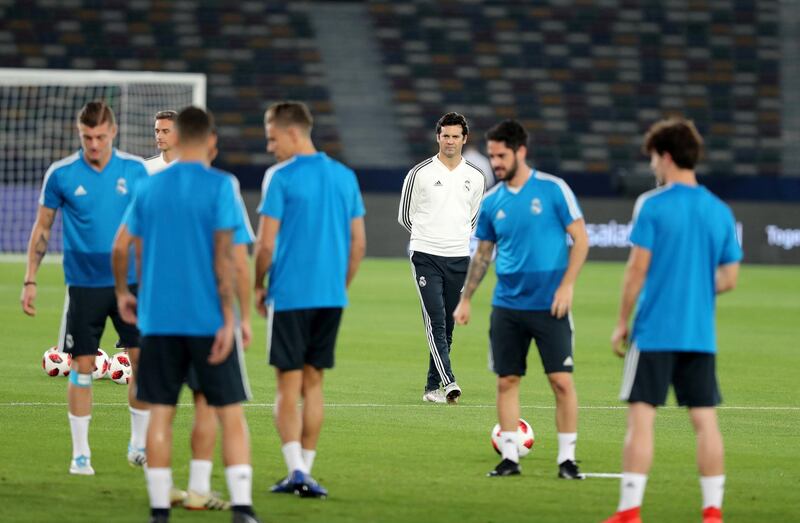 Abu Dhabi, United Arab Emirates - December 21, 2018: Manager of Real Madrid Santiago Solari walks round training ahead of the Fifa Club World Cup final. Friday the 21st of December 2018 at the Zayed Sports City Stadium, Abu Dhabi. Chris Whiteoak / The National