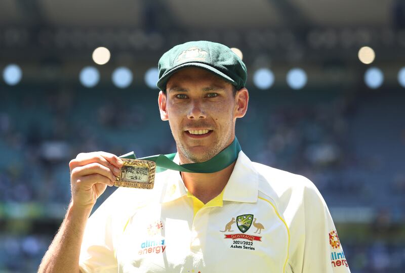 Australia's Scott Boland celebrates with his man of the match award. PA