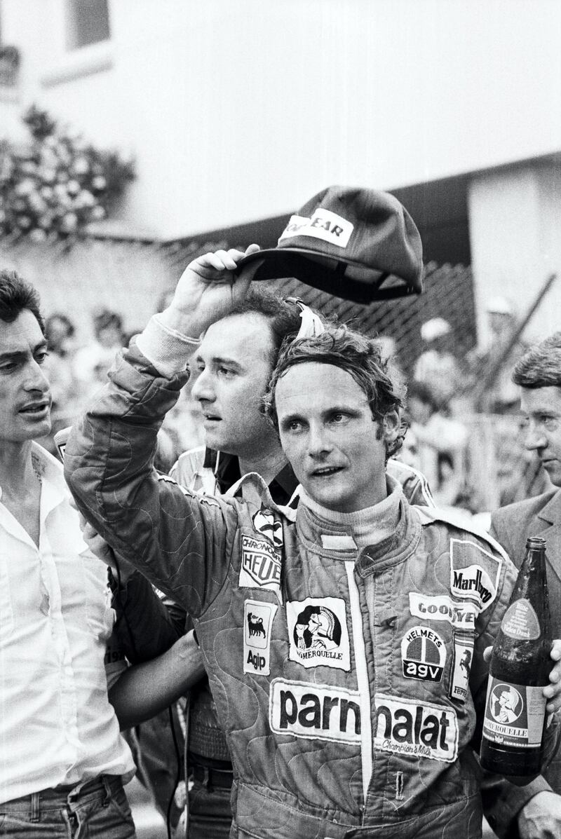 (FILES) In this file photo taken on May 27, 1976 Ferrari's Austrian Formula One driver and World champion Niki Lauda is seen in the pits on Monaco race track during a training session of the 34th Monaco Formula One Grand Prix. - Legendary Formula One driver Niki Lauda has died at the age of 70, his family said in a statement released to Austrian media on May 21, 2019. (Photo by - / AFP)