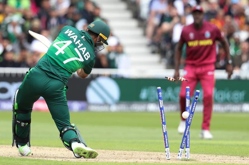 Pakistan's Wahab Riaz is bowled by West Indies' Oshane Thomas. AP Photo