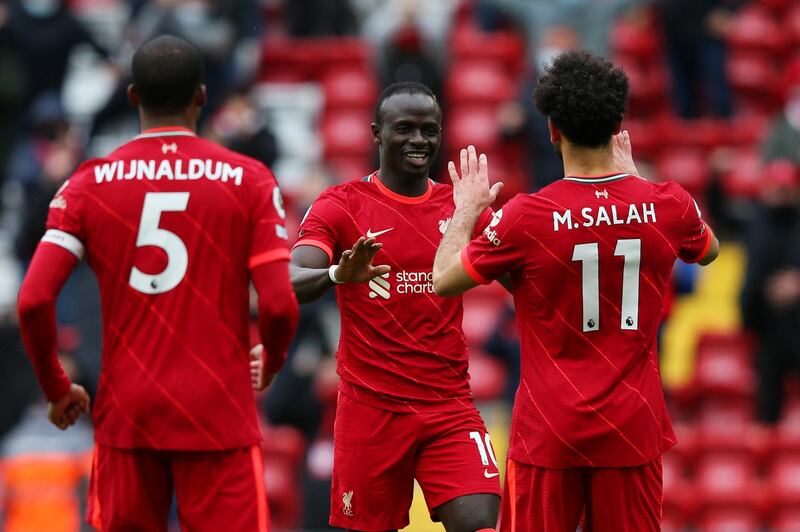 LIVERPOOL, ENGLAND - MAY 23: Sadio Mane of Liverpool celebrates with Mohamed Salah after scoring their side's second goal during the Premier League match between Liverpool and Crystal Palace at Anfield on May 23, 2021 in Liverpool, England. A limited number of fans will be allowed into Premier League stadiums as Coronavirus restrictions begin to ease in the UK. (Photo by Alex Livesey/Getty Images)