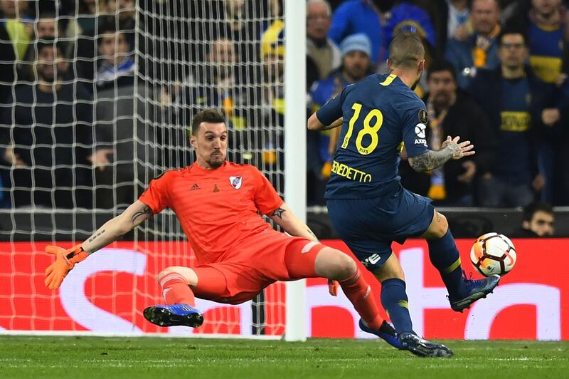 Boca Juniors' Dario Benedetto levelled the game when he scored past River Plate's goalkeeper Franco Armani. AFP/Gabriel BOUYS