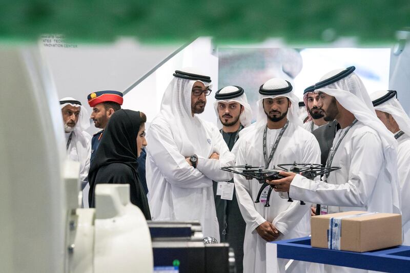 ABU DHABI, UNITED ARAB EMIRATES - February 27, 2018: HH Sheikh Mohamed bin Zayed Al Nahyan, Crown Prince of Abu Dhabi and Deputy Supreme Commander of the UAE Armed Forces (center L), visits the ACTVET (Abu Dhabi Centre for Technical and Vocational Education and Training) stand while touring the Unmanned Systems Exhibtion and Conference (UMEX) 2018 at the Abu Dhabi National Exhibition Centre (ADNEC). 
( Ryan Carter for the Crown Prince Court - Abu Dhabi )
---