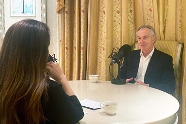 Former British prime minister Tony Blair with The National's Editor-in-Chief Mina Al-Oraibi. The team wore masks during set-up and recording of the podcast but Mr Blair and Ms Al-Oraibi, who had both received negative Covid-19 tests, chose not to during the interview for the reason of maintaining sound quality. Image: The National