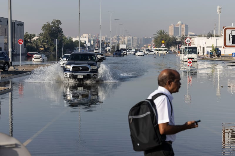 The D65 exit from Sheikh Zayed Road in Al Quoz, Dubai, is flooded, with some cars still abandoned. Antonie Robertson / The National