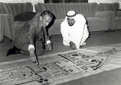 Dr Abdulrahman Makhlouf and Sheikh Zayed in 1974, planning how Abu Dhabi should look as it develops from a small coastal settlement into the UAE capital. Photo: Courtesy National Centre for Documentation and Research