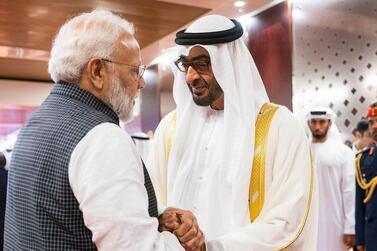 A handout image provided by the United Arab Emirates News Agency (WAM) on August 24, 2019, shows Mohamed bin Zayed al-Nahyan (R), Crown Prince of Abu Dhabi and Deputy Supreme Commander of the UAE Armed Forces (R) and Indian Prime Minister Narendra Modi (L), meeting in the UAE capital. === RESTRICTED TO EDITORIAL USE - MANDATORY CREDIT "AFP PHOTO / HO / WAM" - NO MARKETING NO ADVERTISING CAMPAIGNS - DISTRIBUTED AS A SERVICE TO CLIENTS === / AFP / WAM / STRINGER / === RESTRICTED TO EDITORIAL USE - MANDATORY CREDIT "AFP PHOTO / HO / WAM" - NO MARKETING NO ADVERTISING CAMPAIGNS - DISTRIBUTED AS A SERVICE TO CLIENTS ===