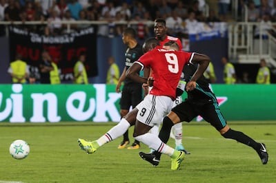 Manchester United's Romelu Lukaku, shoots to score against Real Madrid during the UEFA Super Cup final soccer match between Real Madrid and Manchester United at Philip II Arena in Skopje, Tuesday, Aug. 8, 2017. (AP Photo/Boris Grdanoski)