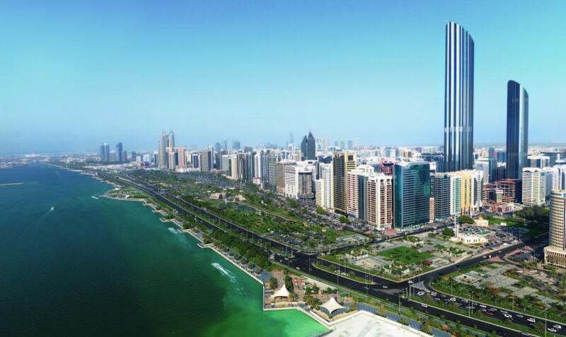 Burj Mohammed Bin Rashid stands tall behind Abu Dhabi's Corniche. Courtesy Aldar