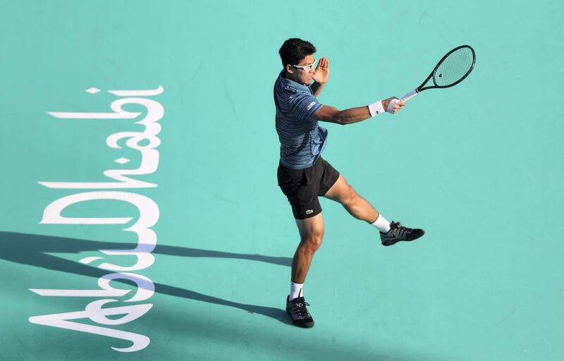 Abu Dhabi, United Arab Emirates - Reporter: Jon Turner: Hyeon Chung hits a shot during the fifth place play-off between Andrey Rublev v Hyeon Chung at the Mubadala World Tennis Championship. Friday, December 20th, 2019. Zayed Sports City, Abu Dhabi. Chris Whiteoak / The National