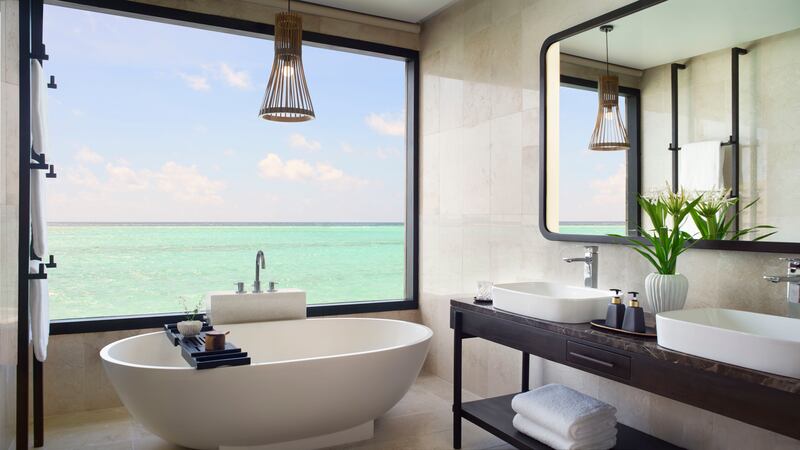 Views over the Indian Ocean from the standalone bathtub are second to none