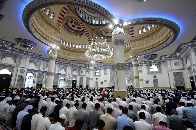 Dubai, United Arab Emirates - August 11, 2019: Early morning Eid prayers take place at Al Farooq Omar Bin Al Khattab Mosque. Sunday the 11th of August 2019. Al Farooq Omar Bin Al Khattab Mosque, Dubai. Chris Whiteoak / The National