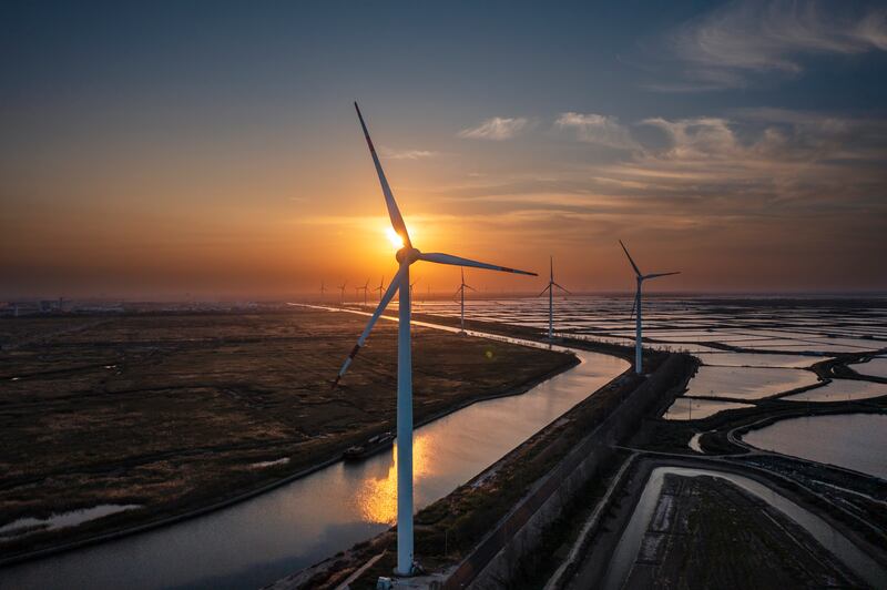 Wind power generators in Yancheng, China. New renewable energy projects in China, the EU and the US accounted for two thirds of installed capacity last year. EPA