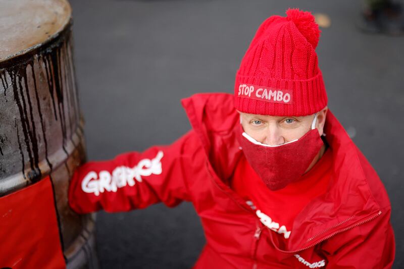 The environmentalists are taking part in a sit-in outside the prime minister's residence on Downing Street to protest against the Cambo oilfield project in the Shetland Islands. AFP