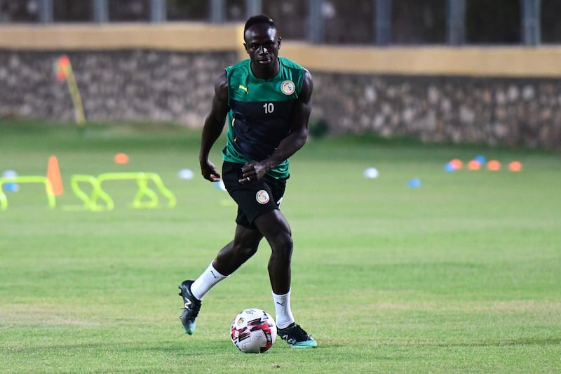 Liverpool's Sadio Mane keeps his eye on the ball as Senegal train for the final time before the Africa Cup of Nations final. AFP