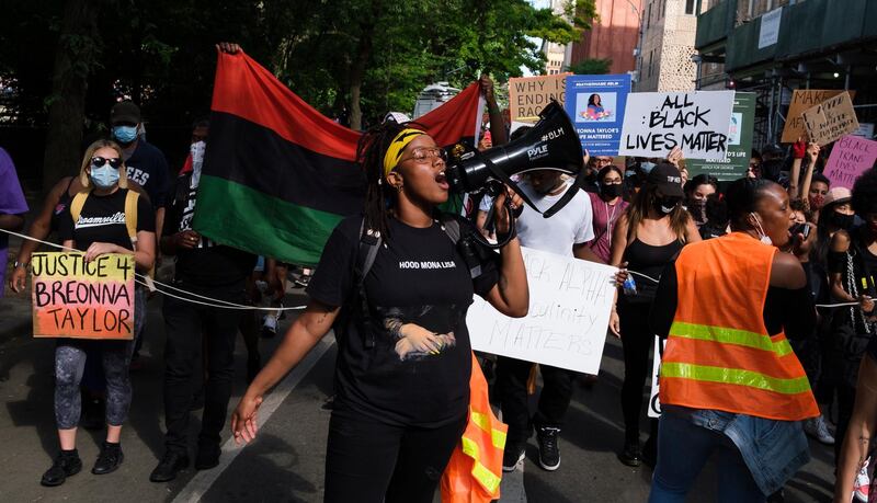 People march during a Black Lives Matter protest against police brutality as part of the larger public response sparked by the recent death of George Floyd, an African-American man who was killed last month while in the custody of the Minneapolis police, in New York.  EPA