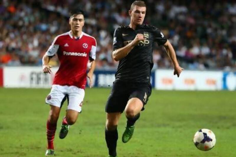 Edin Dzeko's header would be all the scoring Mancester City would need against South China to reach the final of the Asia Trophy tournament, where they will meet a familiar Premier League foe in Sunderland, who were 3-1 victors over Tottenham Hotspur.